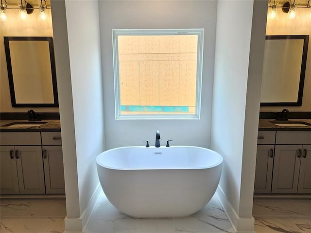 195 Silvercrest Dr, Acworth, GA 30101 - full bathroom with marble finish floors, baseboards, and a freestanding bath