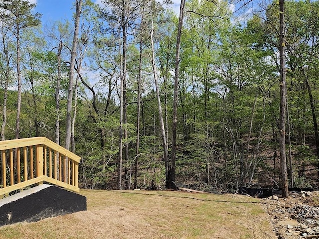195 Silvercrest Dr, Acworth, GA 30101 - view of green lawn featuring a wooded view and a wooden deck