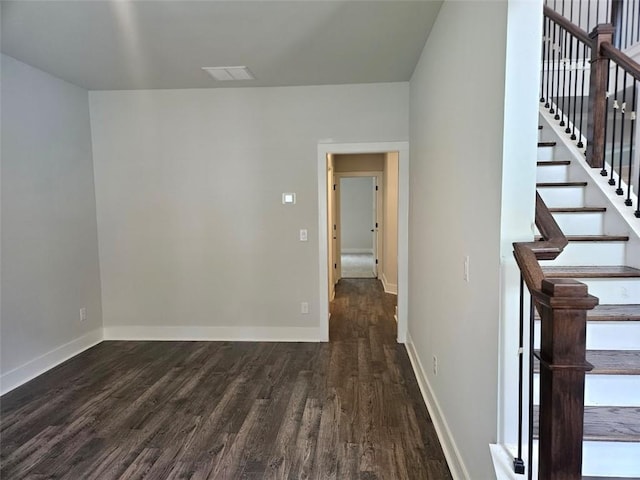 195 Silvercrest Dr, Acworth, GA 30101 - spare room with dark wood-type flooring, baseboards, and stairs