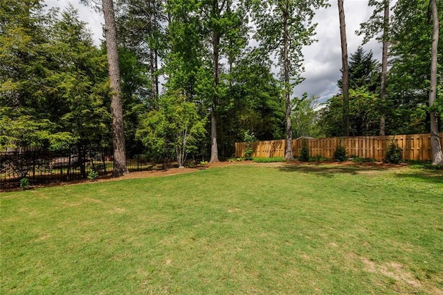 view of yard with fence