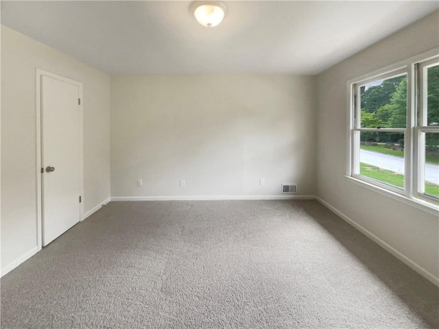 1710 Fontaine Dr, Jonesboro, GA 30236 - carpeted empty room featuring baseboards