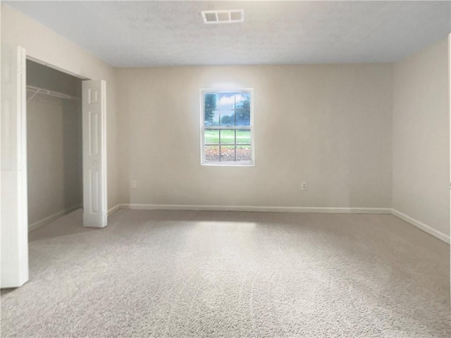 1710 Fontaine Dr, Jonesboro, GA 30236 - unfurnished bedroom featuring baseboards, carpet flooring, and a closet