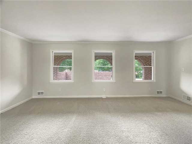 1710 Fontaine Dr, Jonesboro, GA 30236 - spare room featuring crown molding, carpet flooring, and baseboards