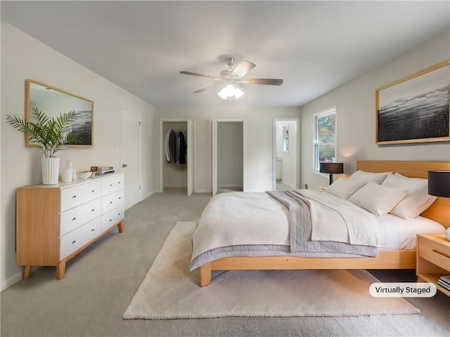 1710 Fontaine Dr, Jonesboro, GA 30236 - bedroom with light carpet, ceiling fan, and baseboards