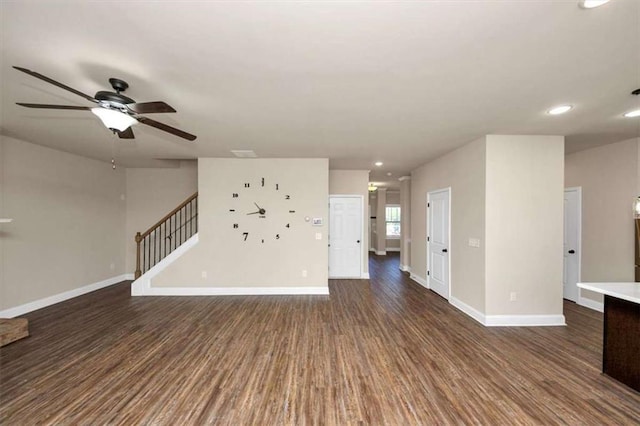 2375 Walker Dr, Hampton, GA 30228 - unfurnished living room with a ceiling fan, stairway, recessed lighting, wood finished floors, and baseboards