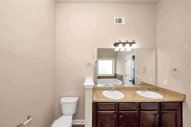 2375 Walker Dr, Hampton, GA 30228 - full bath with toilet, a bath, a sink, and visible vents