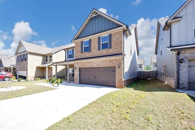 2375 Walker Dr, Hampton, GA 30228 - craftsman-style house with driveway, board and batten siding, an attached garage, a front yard, and brick siding