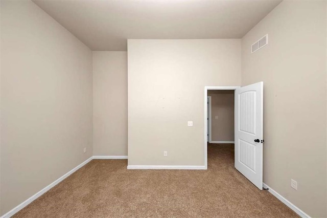 2375 Walker Dr, Hampton, GA 30228 - empty room featuring carpet flooring, visible vents, and baseboards