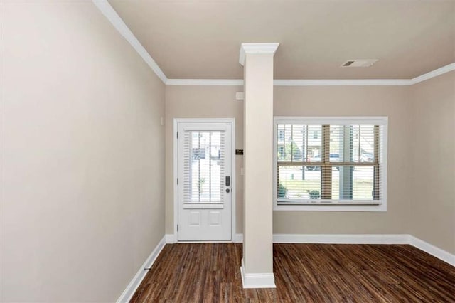 2375 Walker Dr, Hampton, GA 30228 - entryway with dark wood-type flooring, baseboards, and ornamental molding
