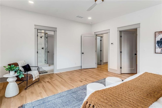 bedroom with baseboards, light wood-style flooring, visible vents, and recessed lighting