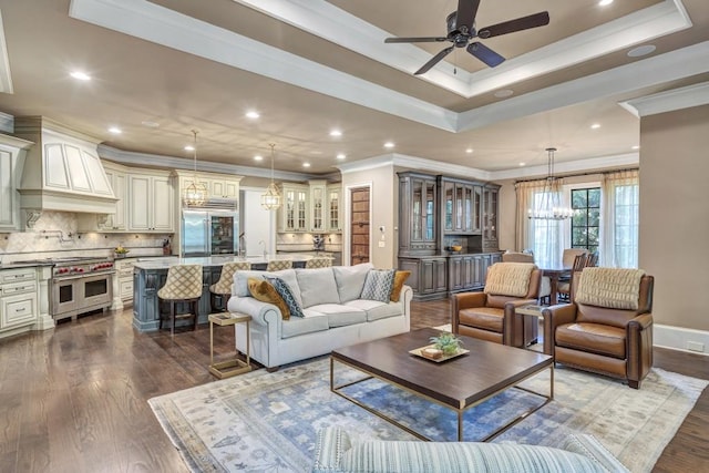 4317 Oglethorpe Loop NW, Acworth, GA 30101 - living area featuring ornamental molding, a chandelier, recessed lighting, a ceiling fan, and dark wood-type flooring