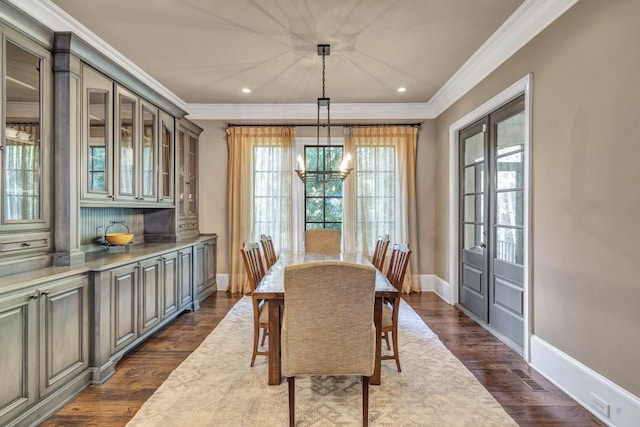 4317 Oglethorpe Loop NW, Acworth, GA 30101 - dining area with ornamental molding, a chandelier, dark wood-style floors, and recessed lighting