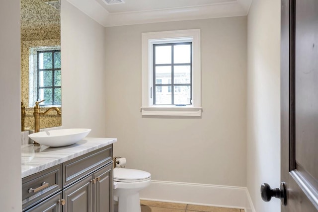 4317 Oglethorpe Loop NW, Acworth, GA 30101 - half bathroom with vanity, crown molding, and tile patterned floors