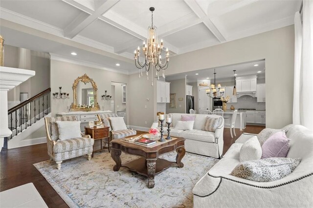 living area with an inviting chandelier, coffered ceiling, stairs, and beam ceiling