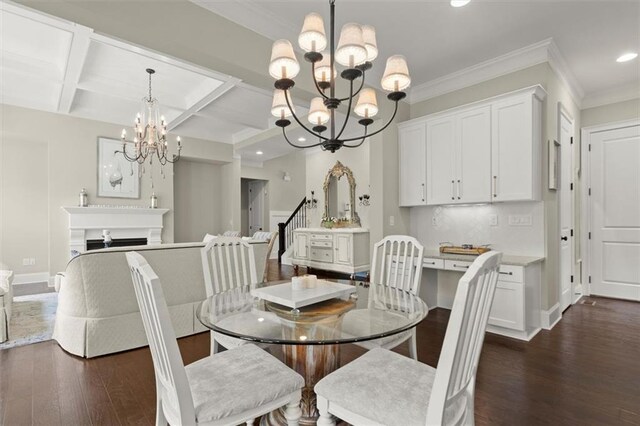 dining space with coffered ceiling, dark wood finished floors, and a chandelier