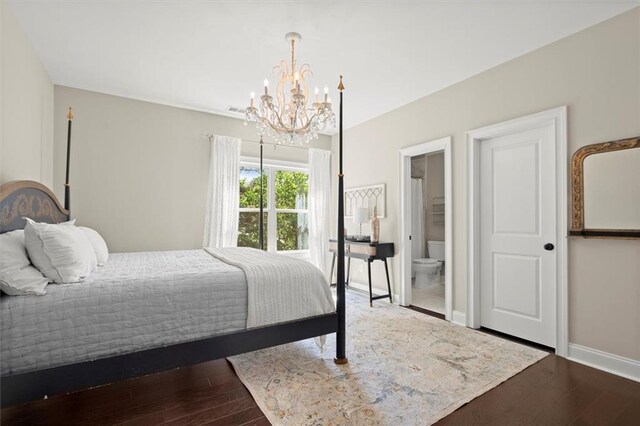 bedroom featuring baseboards, visible vents, a notable chandelier, and dark wood-style floors