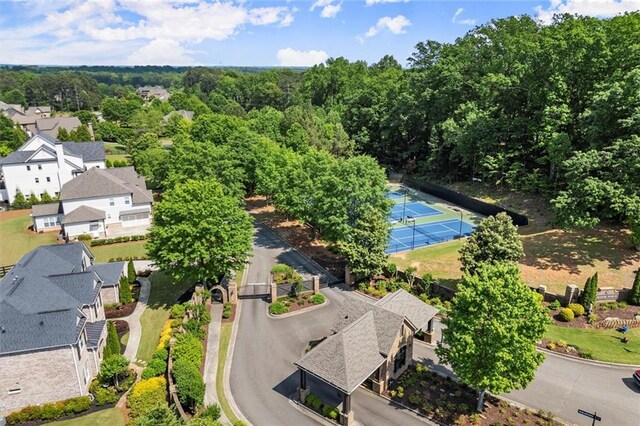 birds eye view of property with a residential view