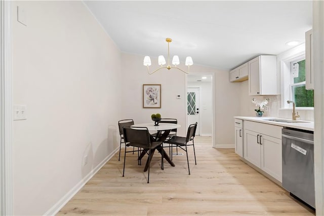 1010 Martin Ln, Canton, GA 30114 - dining area with light wood-style floors, a chandelier, and lofted ceiling