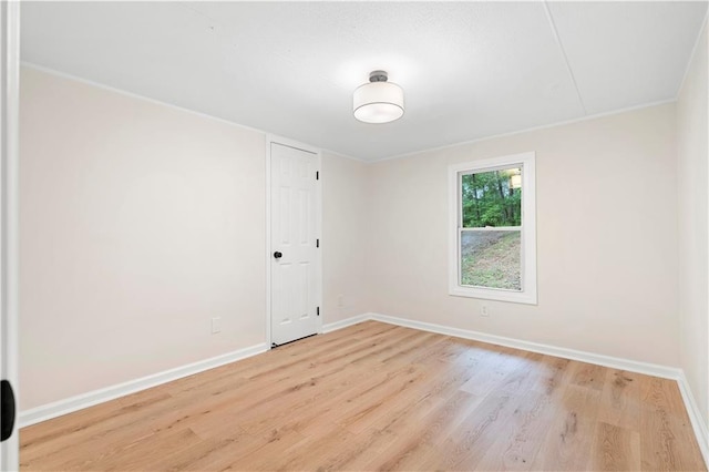 1010 Martin Ln, Canton, GA 30114 - spare room featuring light wood-style floors and baseboards