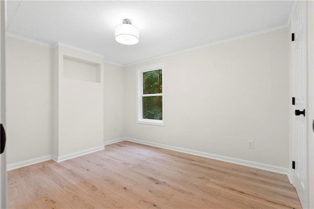 1010 Martin Ln, Canton, GA 30114 - empty room featuring light wood-style floors and ornamental molding