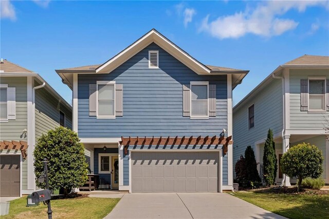 view of front of property with an attached garage and driveway
