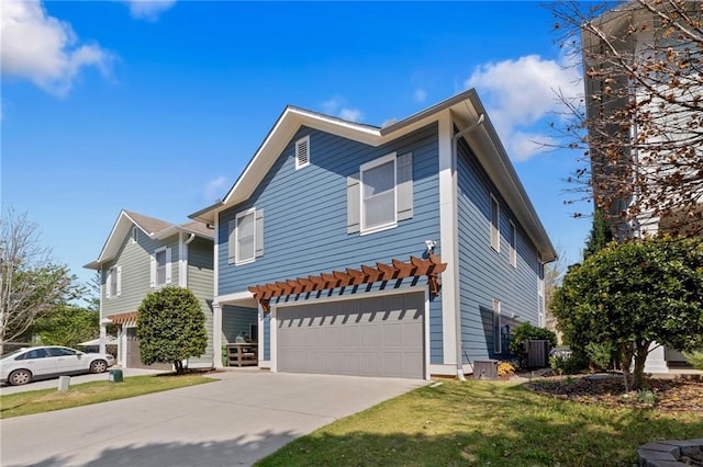 view of front of property featuring driveway, an attached garage, a front lawn, and central air condition unit