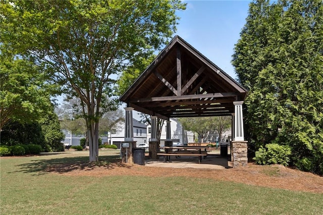 view of home's community with a gazebo and a lawn