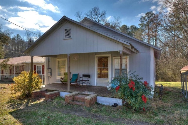 view of front of house with a wooden deck