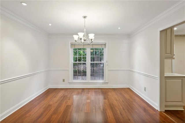 unfurnished dining area featuring an inviting chandelier, ornamental molding, and dark wood-type flooring