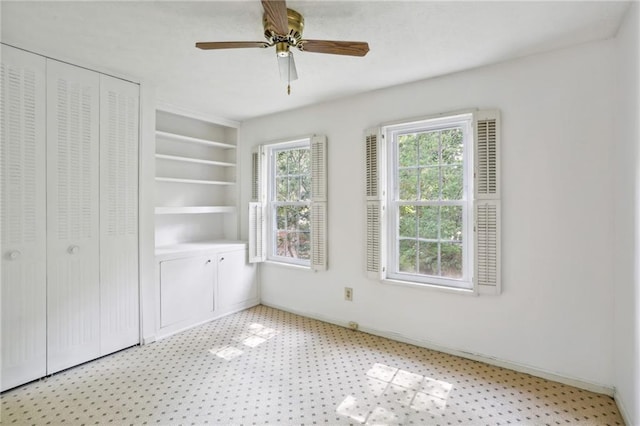 unfurnished bedroom featuring a closet and ceiling fan