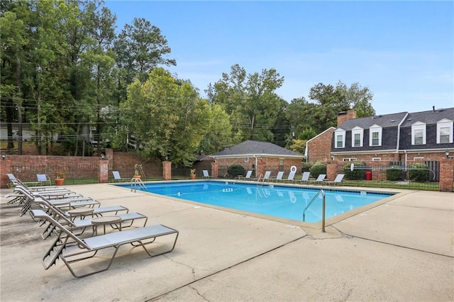 view of pool with a patio area