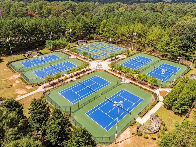 aerial view featuring a wooded view