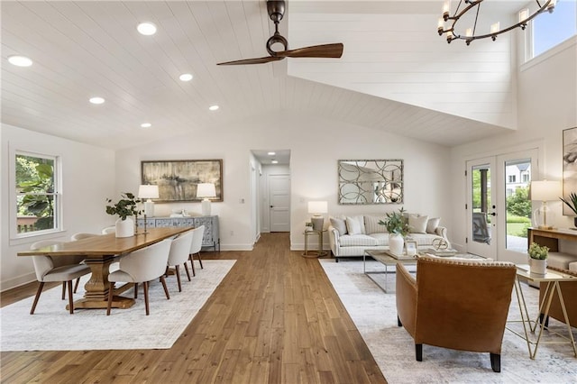 221 Brooke Dr, Alpharetta, GA 30009 - dining area featuring lofted ceiling, healthy amount of natural light, recessed lighting, wood-type flooring, and a chandelier
