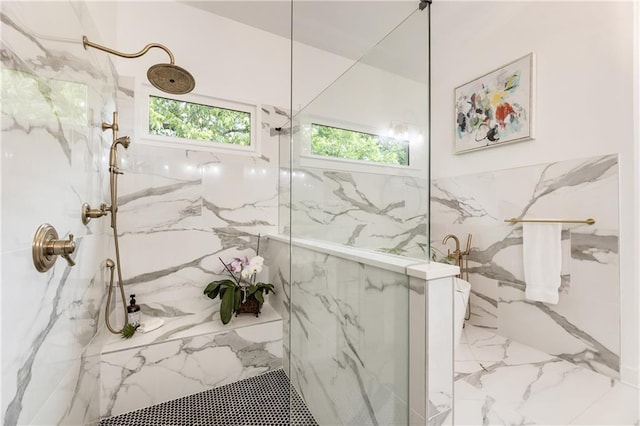 221 Brooke Dr, Alpharetta, GA 30009 - bathroom featuring a marble finish shower, marble tiled flooring, and tile walls