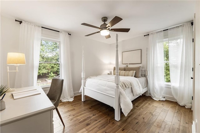 221 Brooke Dr, Alpharetta, GA 30009 - bedroom featuring hardwood / wood-style flooring, a ceiling fan, and baseboards