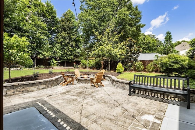 221 Brooke Dr, Alpharetta, GA 30009 - view of patio / terrace featuring an outdoor fire pit