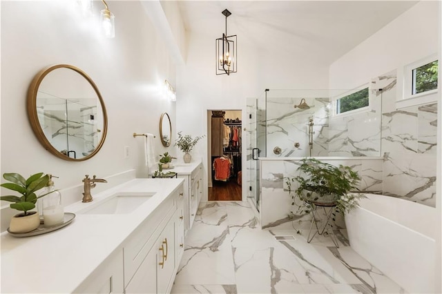 221 Brooke Dr, Alpharetta, GA 30009 - full bath featuring vanity, a marble finish shower, a freestanding tub, and marble tiled floors