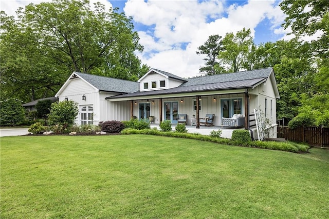 221 Brooke Dr, Alpharetta, GA 30009 - view of front of property featuring board and batten siding, covered porch, and french doors