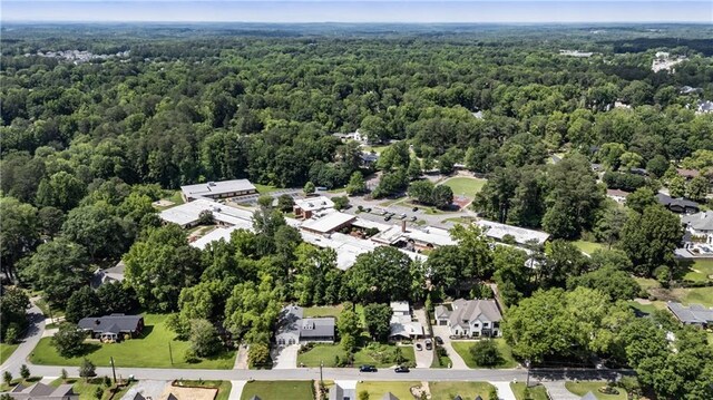 221 Brooke Dr, Alpharetta, GA 30009 - aerial overview of property's location with a forest and nearby suburban area