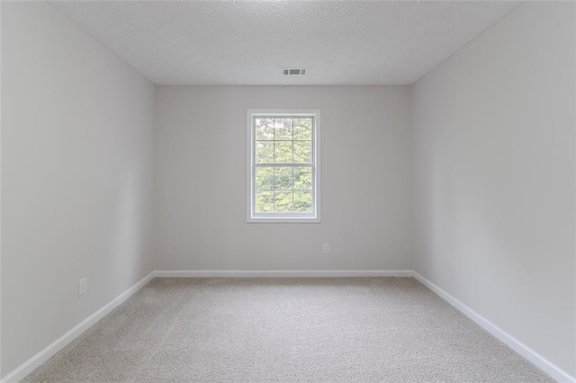 1706 Brandon Lee Way SW, Marietta, GA 30008 - empty room featuring carpet flooring, a textured ceiling, and baseboards