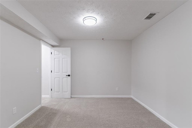 1706 Brandon Lee Way SW, Marietta, GA 30008 - empty room featuring a textured ceiling, carpet flooring, and baseboards