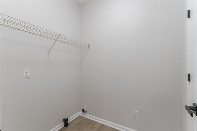 1706 Brandon Lee Way SW, Marietta, GA 30008 - washroom with baseboards and light wood-style floors
