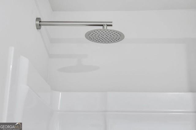 interior details with a shower