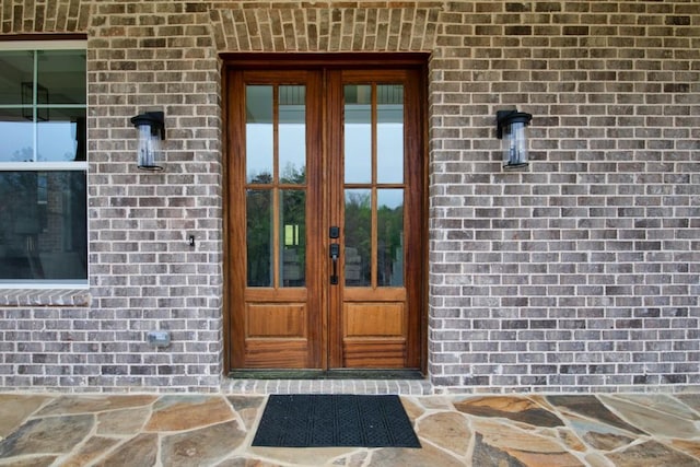 property entrance featuring french doors
