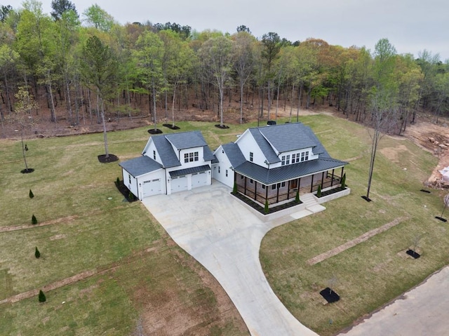 bird's eye view with a view of trees