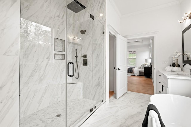 ensuite bathroom with a marble finish shower, marble finish floor, crown molding, and ensuite bathroom