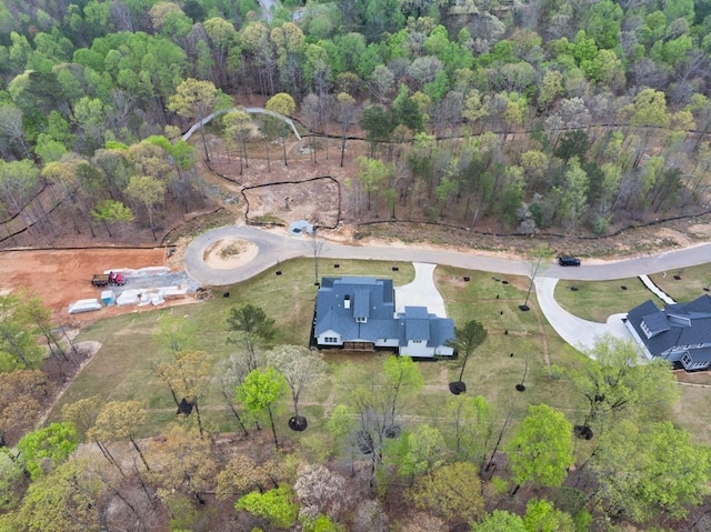 aerial view featuring a view of trees