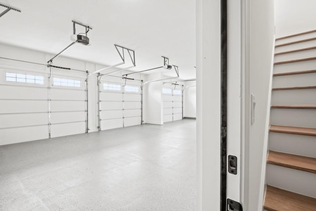 garage featuring a garage door opener