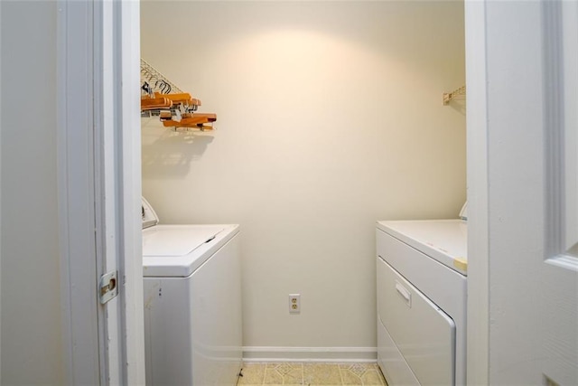 7500 Roswell Rd Unit 18, Sandy Springs, GA 30350 - laundry area featuring separate washer and dryer and baseboards