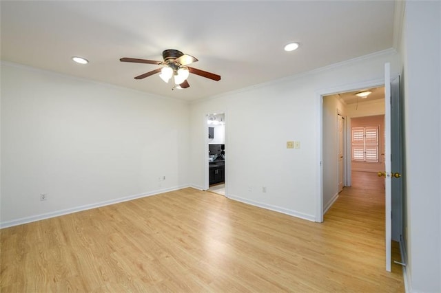 7500 Roswell Rd Unit 18, Sandy Springs, GA 30350 - unfurnished room with ceiling fan, crown molding, attic access, light wood finished floors, and recessed lighting